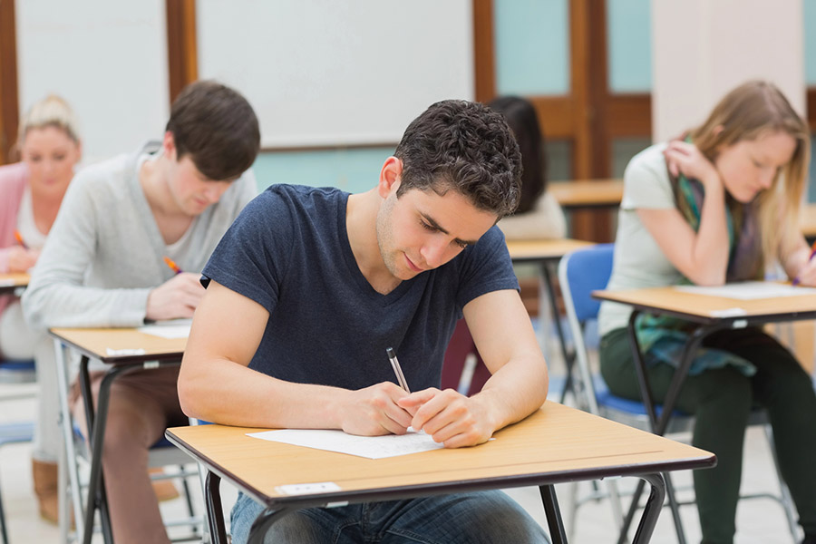 Students taking a test in a classroom in Ontario